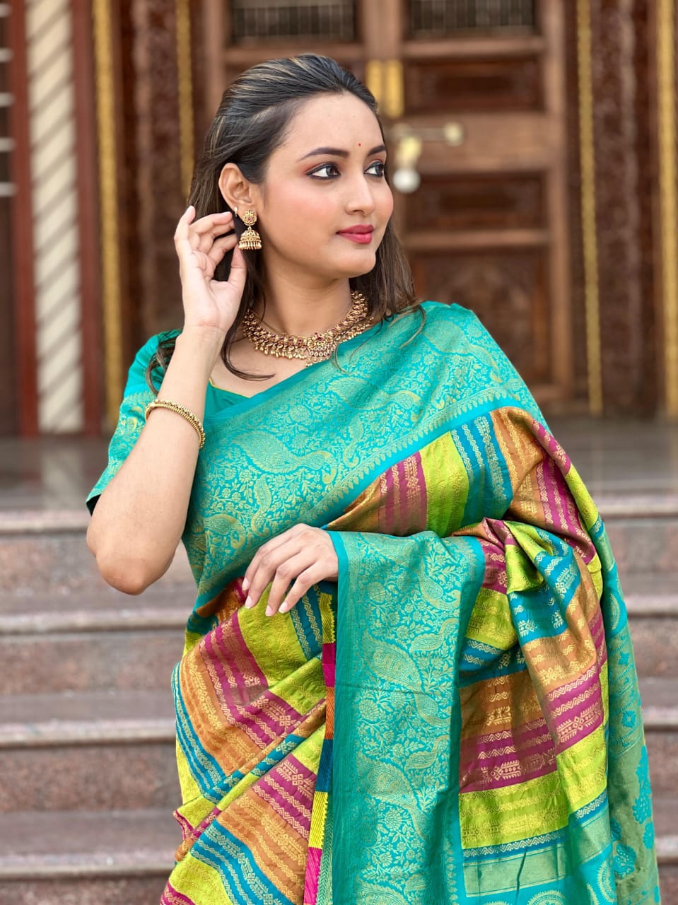 Vedaa Kadiyal stripes Paithani Saree