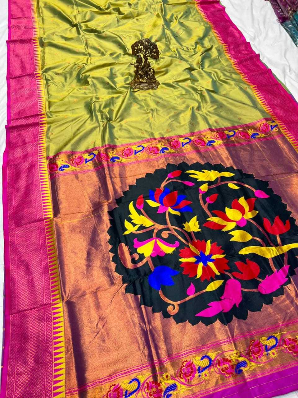 Olive green  color with fancy Lotus pallu  paithani saree