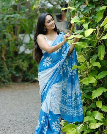 White and sky blue  soft linen printed saree