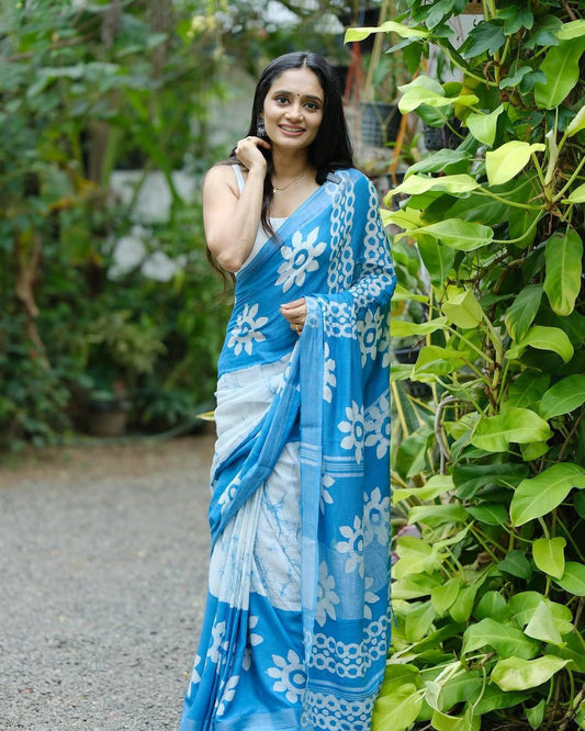 White and sky blue  soft linen printed saree